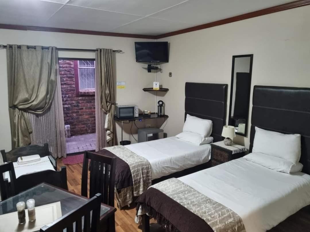 7A Jameson Guesthouse Kimberley Szoba fotó